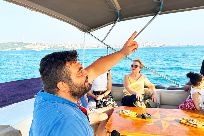 Bosphorus & Golden Horn: Sunset Yacht Cruise with Expert Guide - Ortaköy Mosque and the Bosphorus skyline