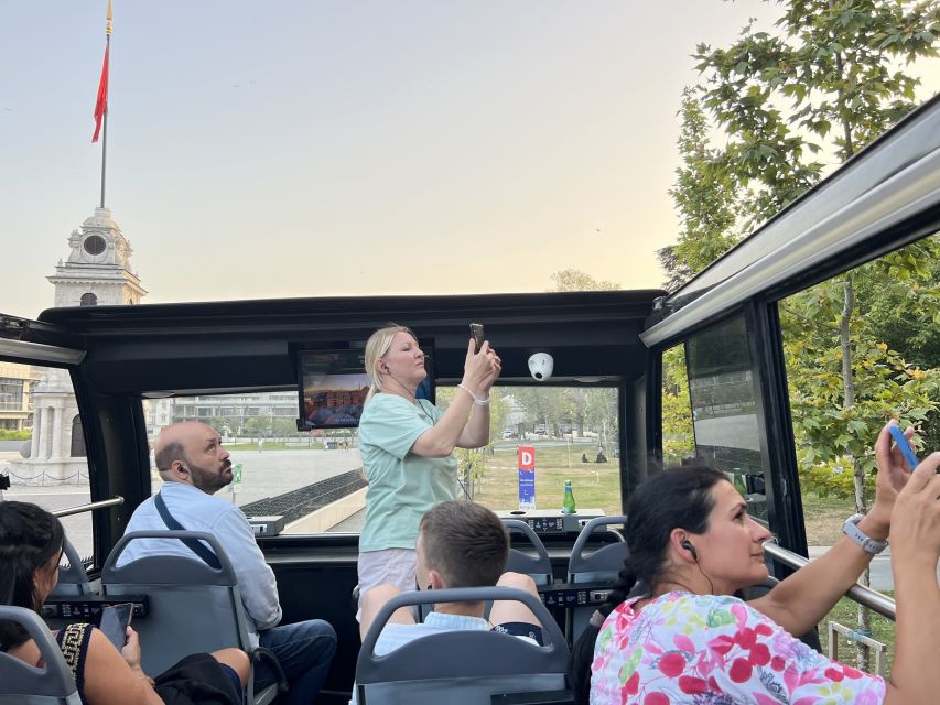 Istanbul: Two Continents Evening Bus Tour with Commentary - Galataport to Dolmabahçe: Bosphorus waterfront views on the move